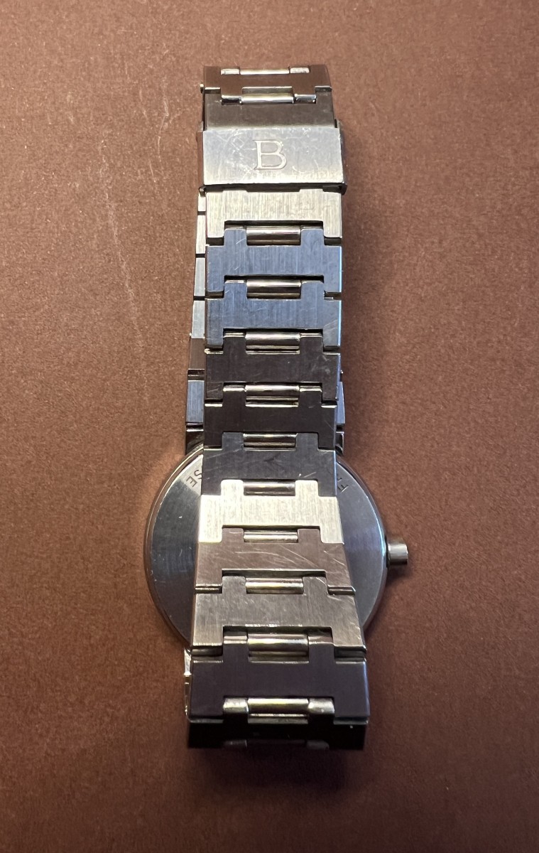 Montre de femme en acier et cadran fond noir signé BULGARI -photo-3