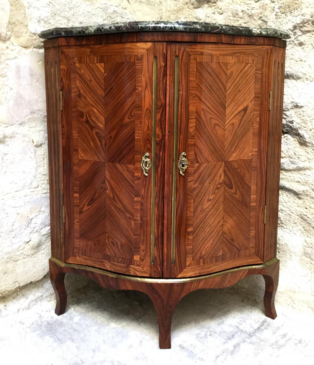 A Regence Ormolu-mounted Kingwood, Rosewood Veneer Encoignure. Early 18th