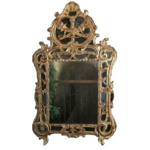 Miroir d’époque Louis XV, aux attributs de la déesse Artémis. 