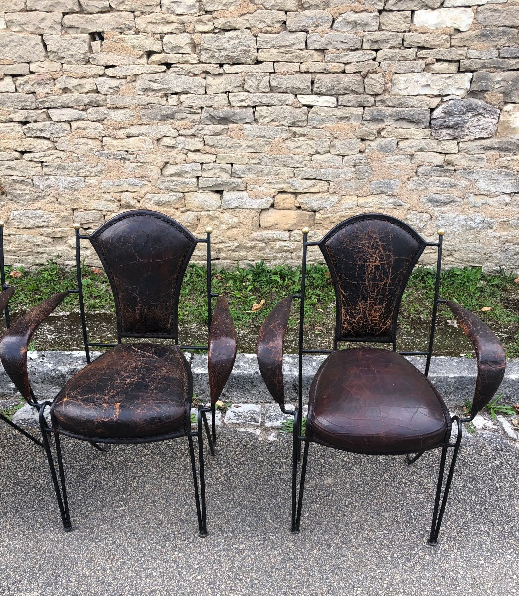 Suite de quatre fauteuils en fer, laiton et cuir par jacques adnet.-photo-2
