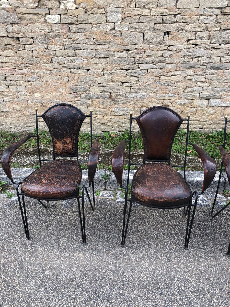 Suite de quatre fauteuils en fer, laiton et cuir par jacques adnet.-photo-3