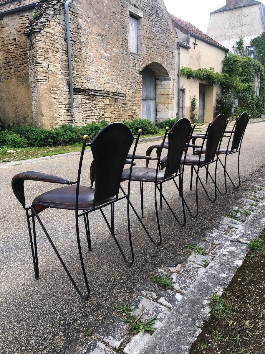 Suite de quatre fauteuils en fer, laiton et cuir par jacques adnet.-photo-4