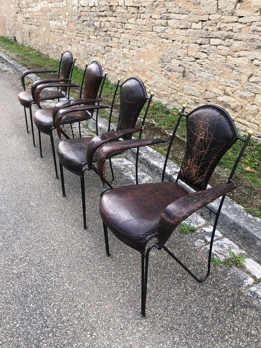 Suite de quatre fauteuils en fer, laiton et cuir par jacques adnet.-photo-2