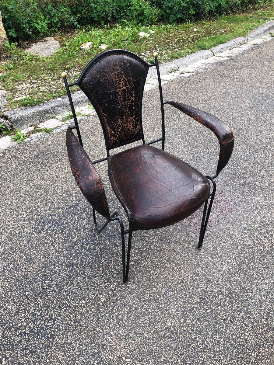 Suite de quatre fauteuils en fer, laiton et cuir par jacques adnet.-photo-8