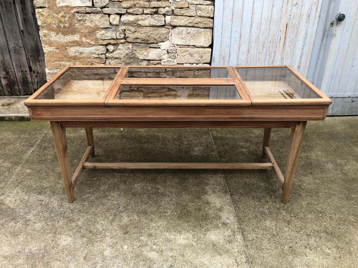 Old Large Window In The Middle Of A Store.