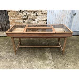 Old Large Window In The Middle Of A Store.