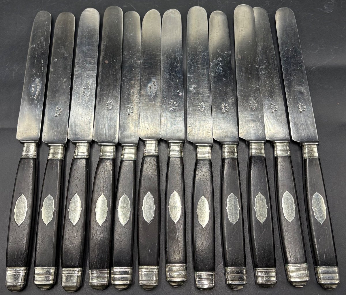 A Series Of Large Table Knives Assembled Steel Ebony And Solid Silver From The Early 19th Belgi