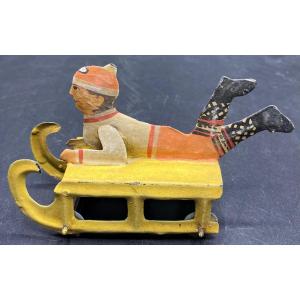 Child's Toy On A French Painted Tin Sled From The 1900s