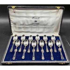 COFFRET DE DOUZE CUILLÈRES À MOKA VERS 1920 EN MÉTAL ARGENTÉ CHRISTOFLE MODÈLE PALME