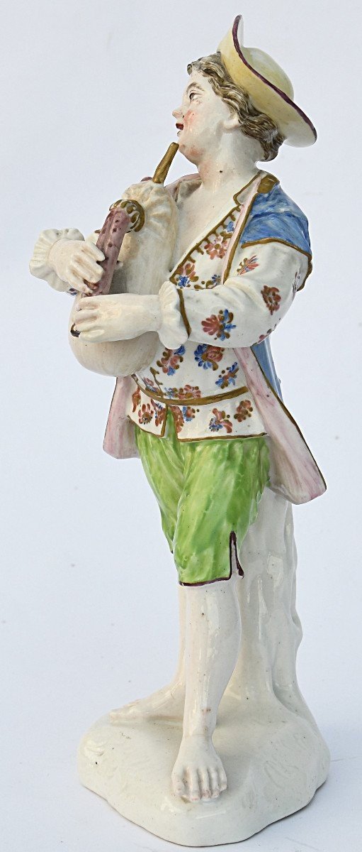 Porcelain Statuette A Young Boy Playing The Bagpipes -photo-4