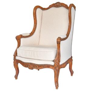 Fauteuil bergère à oreilles de style Louis XV 