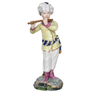 Statuette en porcelaine de Höchst Passau représentant un flûtiste de la série L'orchestre turc