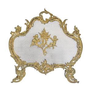 Écran de cheminée en bronze ciselé et doré de style Louis XV