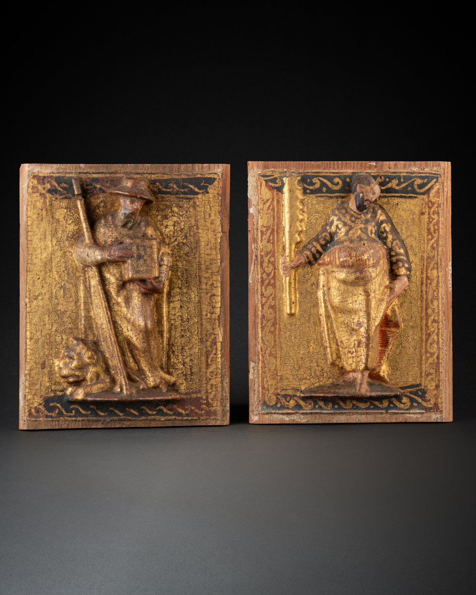 A Magnificent Pair Of Carved Spanish Panels