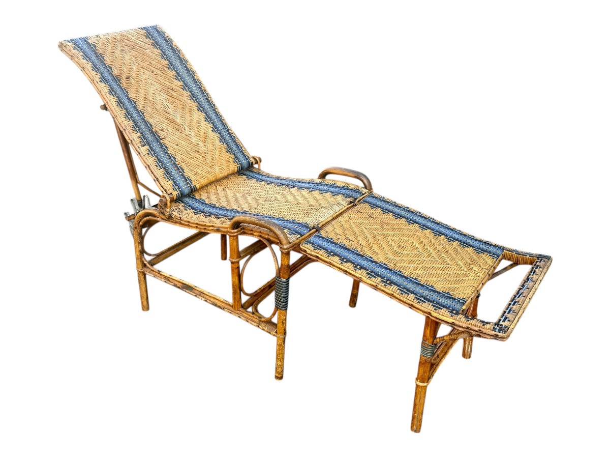 Chaise longue en rotin, années 1930,  très bon état - Long. 160 cm. 