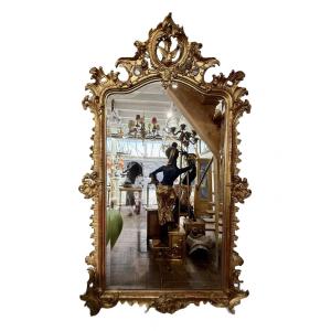 Très important miroir Napoléon III de style Louis XV en bois doré - Haut. 213 cm. 