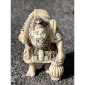 Netsuke En Ivoire représentant Le Pécheur 