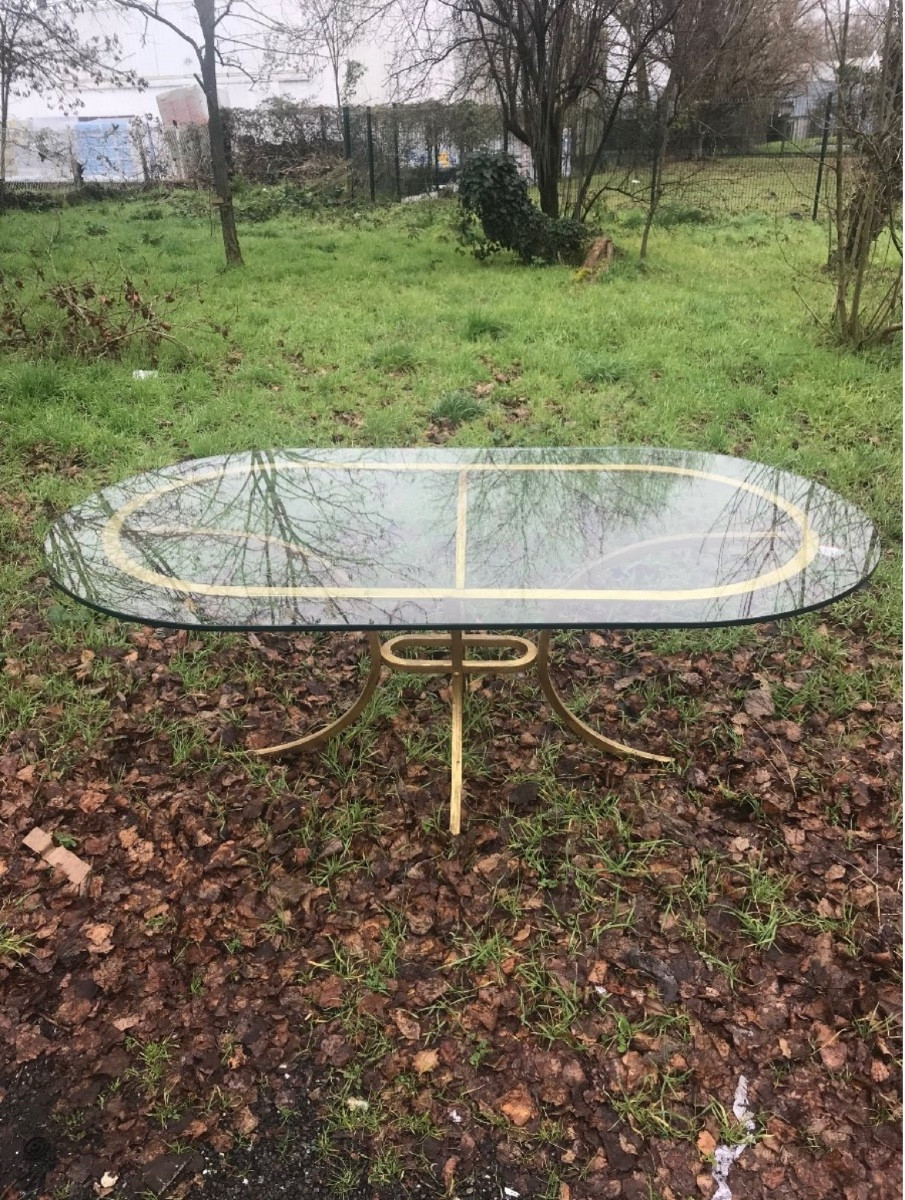 Table de Roger Thibier en fer doré.