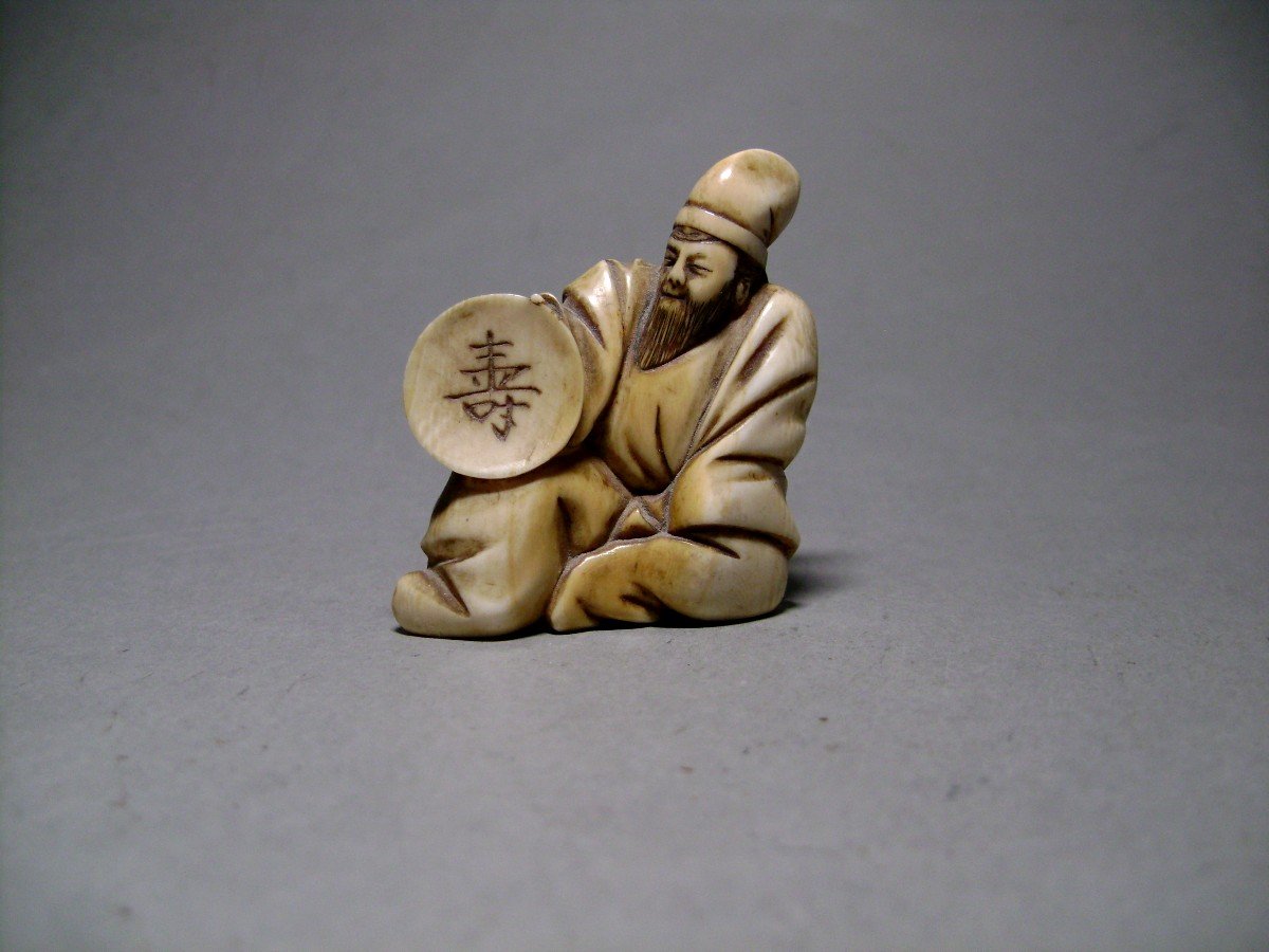 Netsuke en ivoire. Vieux moine. Japon fin Edo Début Meiji.