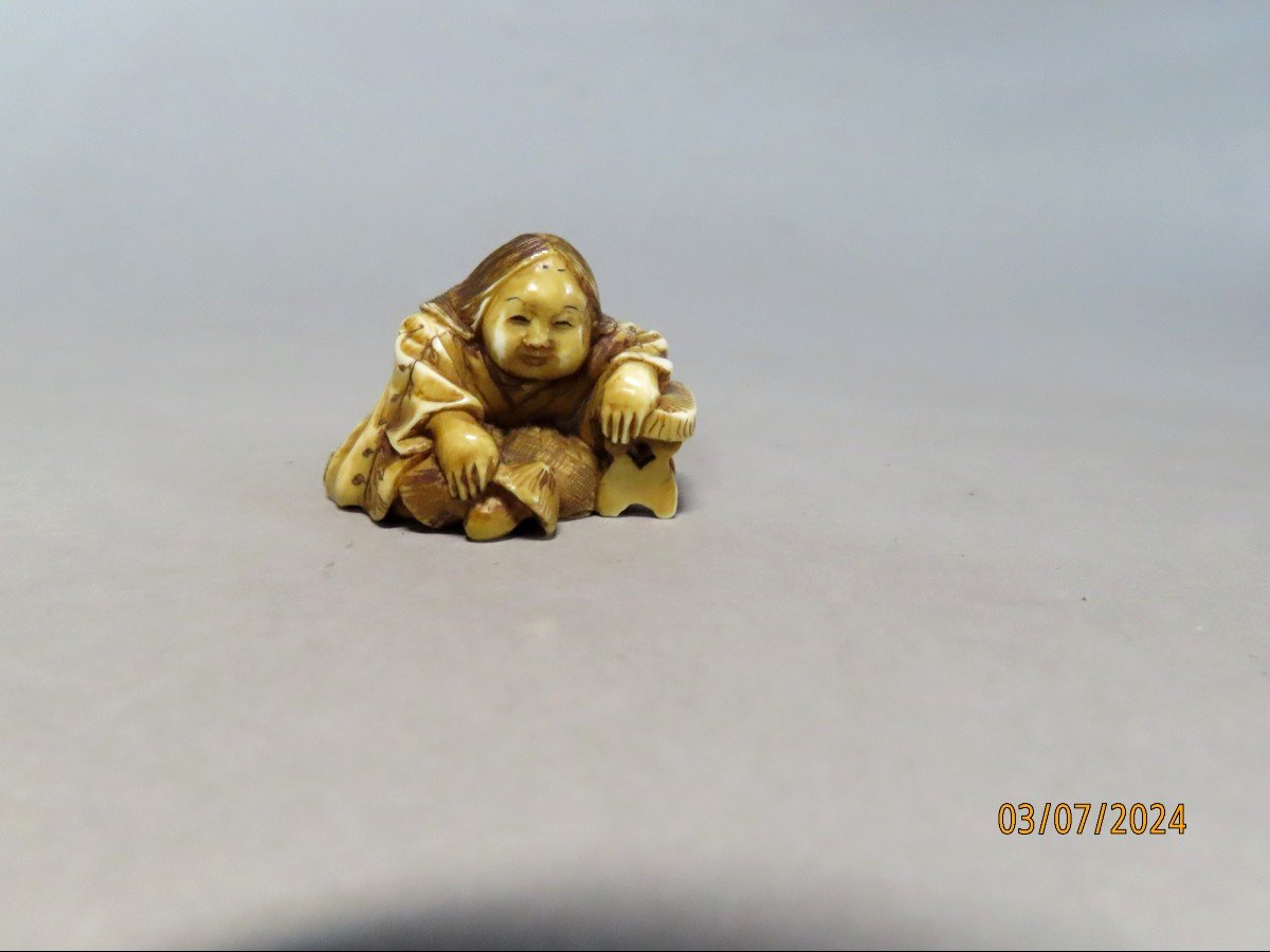 Ivory Netsuke. Okame With Mushrooms. Japan Meiji Period (1868-1912)