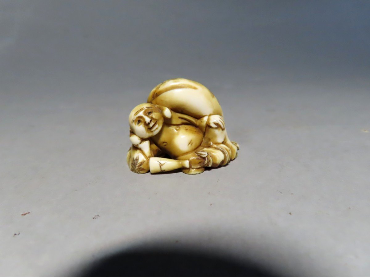 Ivory Netsuke. Hotei And His Bag Of Riches. Japan, Meiji Period (1868-1912)