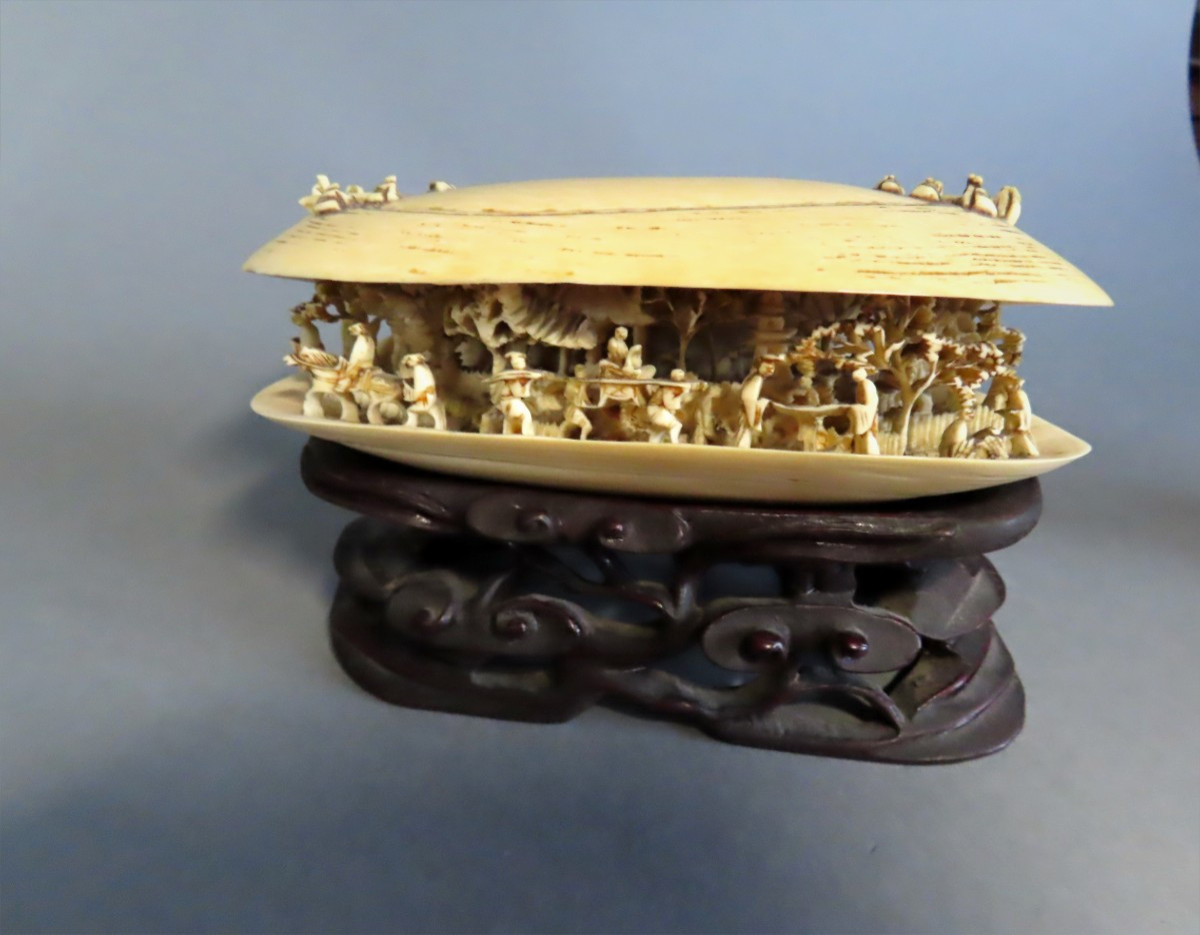 Ivory Okimono. Large Inhabited Shell. China, Early 20th Century.