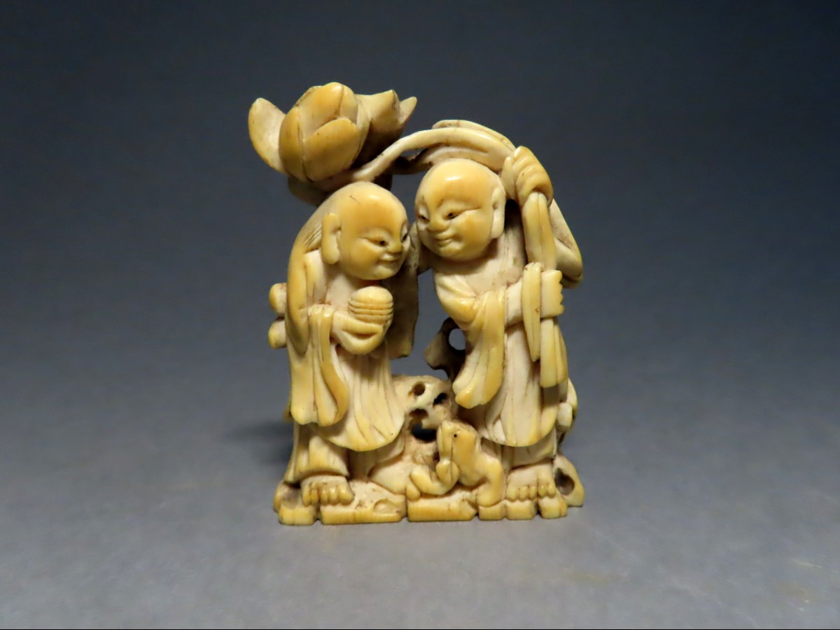 Ivory Netsuke. Lotus Flower Karako. Japan, Late Edo - Early Meiji.