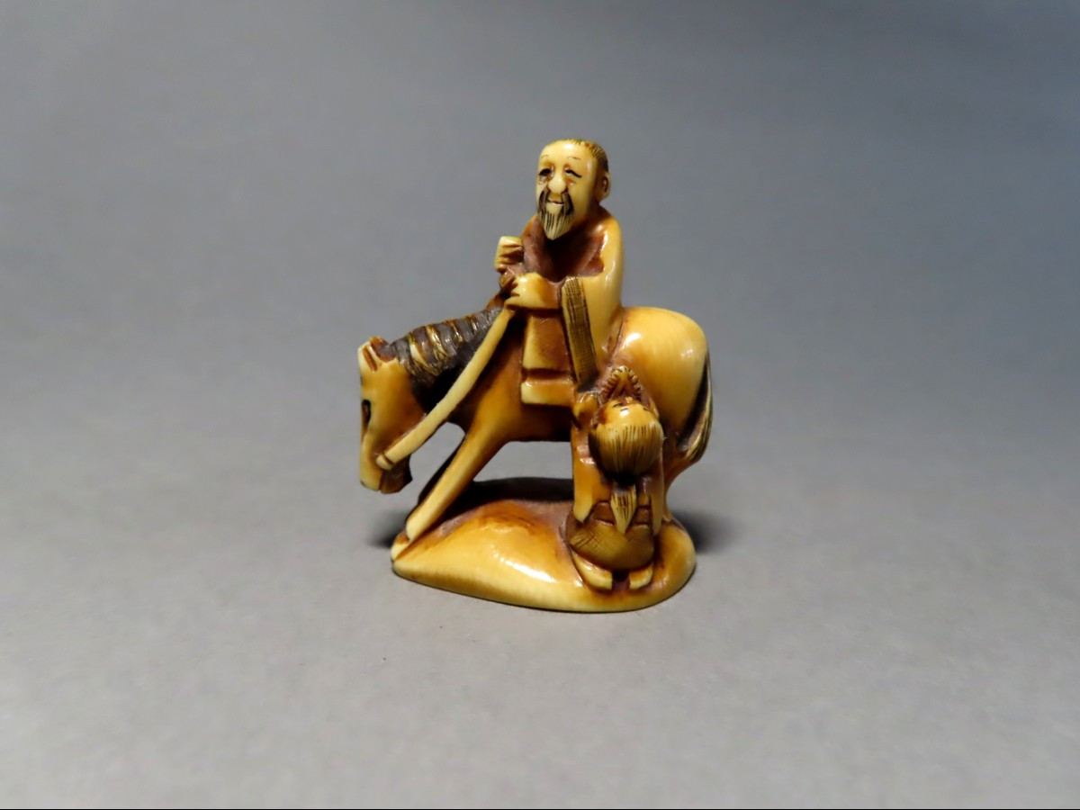 Netsuke en ivoire. La légende de Choryo et Kosekiko.  Signé Masayuki, Japon époque Meiji 