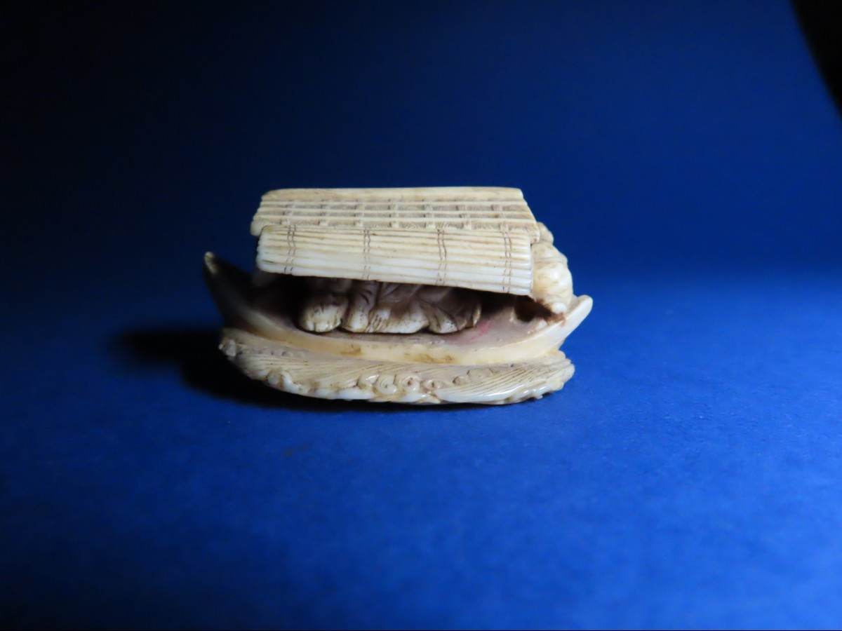 Ivory Netsuke. Sleeping Boat. Signed Masaharu, Tokyo School, Meiji Period, Japan (1868-1912)