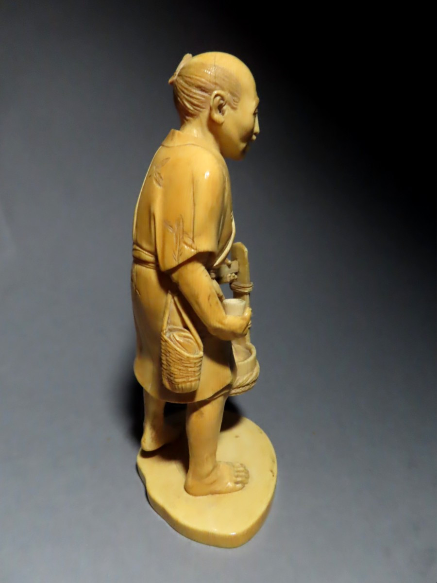 Ivory Okimono. Street Scene, Sake Vendor, Meiji Period Japan (1868-1912).-photo-1