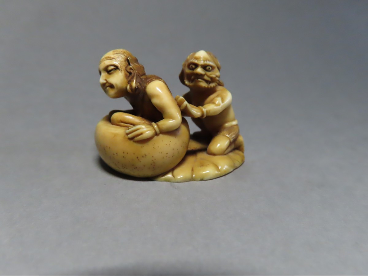 Ivory Netsuke. Oni Washing A Man. Japan, Meiji Period (1868-1912)