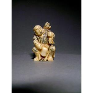 Netsuke en ivoire. Bûcheron. Japon Fin époque Taisho (1912-1928 )