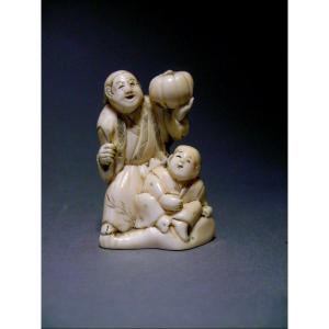 Netsuke en Ivoire. Marchand de citrouille. Ecole de Nagoya. Japon époque Meiji (1868-1912 )