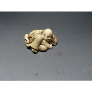 Ivory Okimono. Hotei And His Bag Of Riches. Japan, Late Meiji - Early Taisho. Signed Jusan.