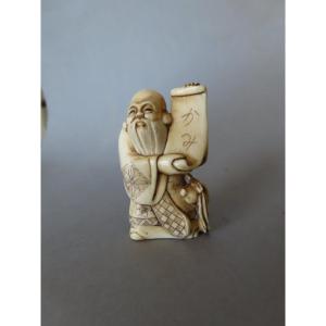 Ivory Netsuke. Fukurokuju Reading. Japan, Taisho Period (1912–1928)