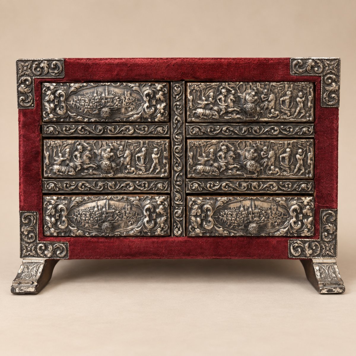Petit cabinet à six tiroirs gainé de velours rouge, 