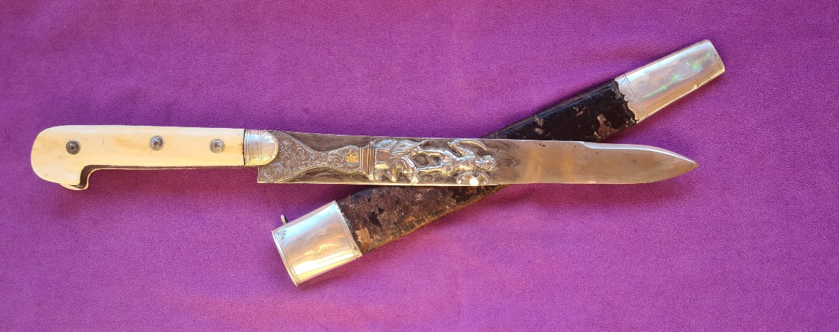 Richly Chiseled Cutlass, "eared" Handle 