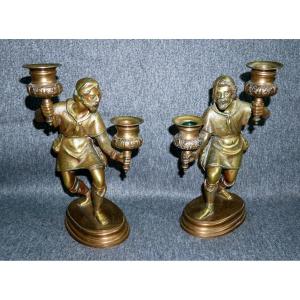 Pair Of Neo-gothic Bronze Candlesticks, Torch-bearing Characters, Hunters, 19th Century