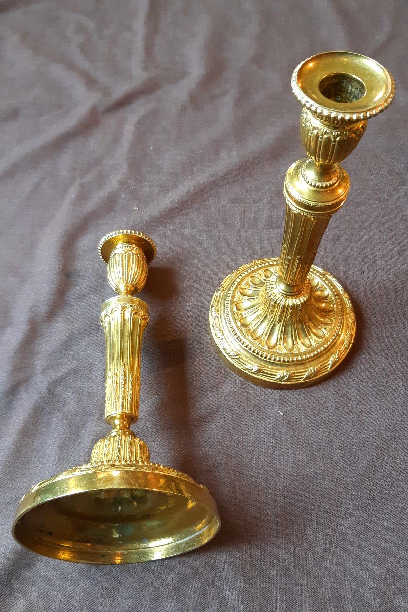 Pair Of Chiseled And Gilded Bronze Candlesticks From The Louis XVI Period