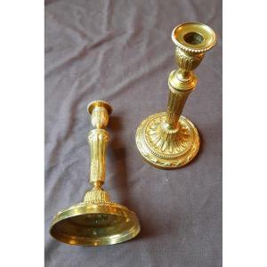 Paire de chandeliers en bronze ciselé et doré d'époque Louis XVI