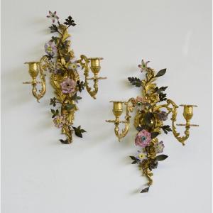 A Pair Of Wall Sconces With Flowers Procellain