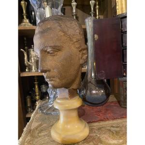 Tête de jeune homme , terre cuite par Félix Desruelles