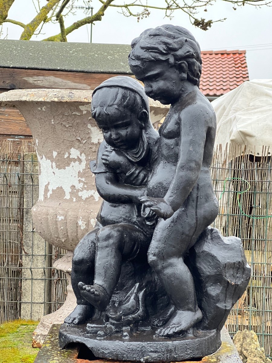 Old Child Couple In Cast Iron XIX