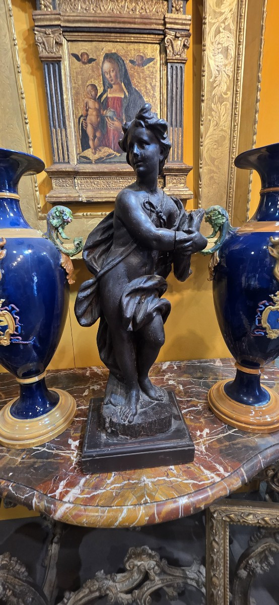 Wooden Sculpture Depicting A Female Figure