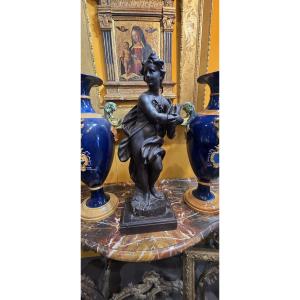 Wooden Sculpture Depicting A Female Figure