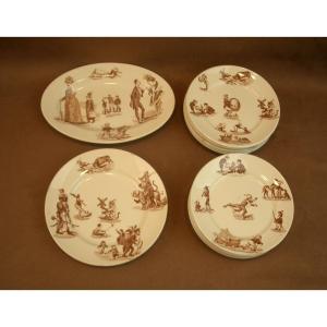 Partie de Dinette en faience de Luneville décor humoristique Granville 