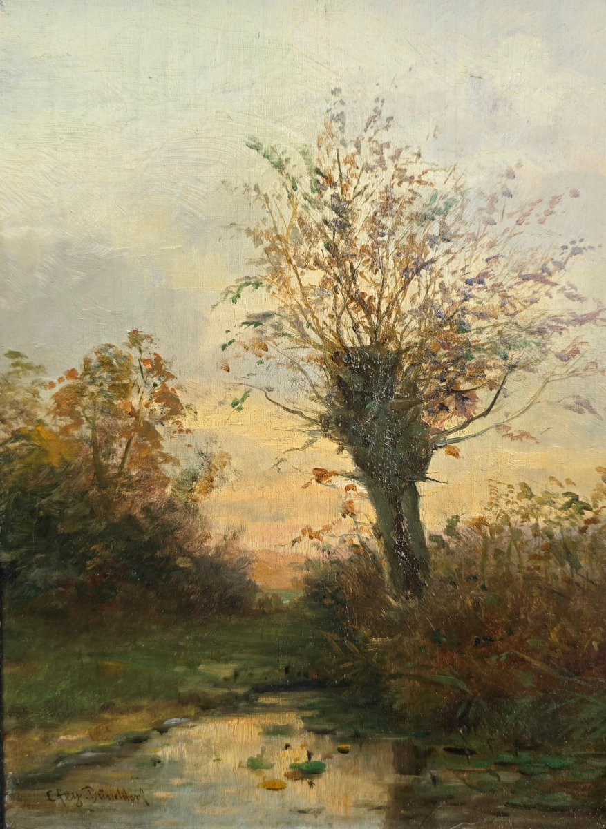 Carl Fey (1867-1939) - école allemande - Dusseldorf - paysage de rivière au ciel couchant 