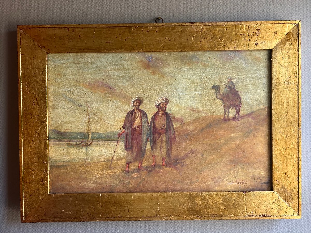 An Orientalist Painting Featuring A Camel And Two Bedouins, Early 20th Century