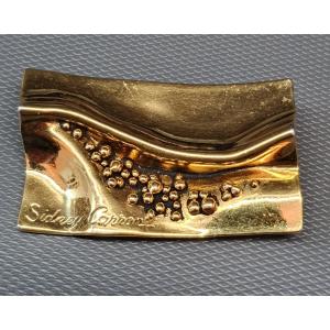 broche Sidney Carron