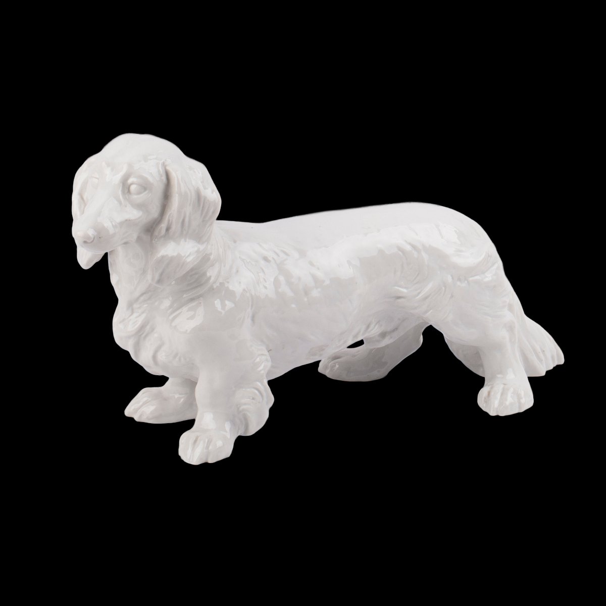 Porcelaine Allach–Teckel à poil long, modèle 75, d’après Ottmar Obermaier, fin des années 1930